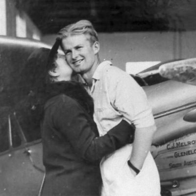 Jimmy Melrose being embrassed by a woman