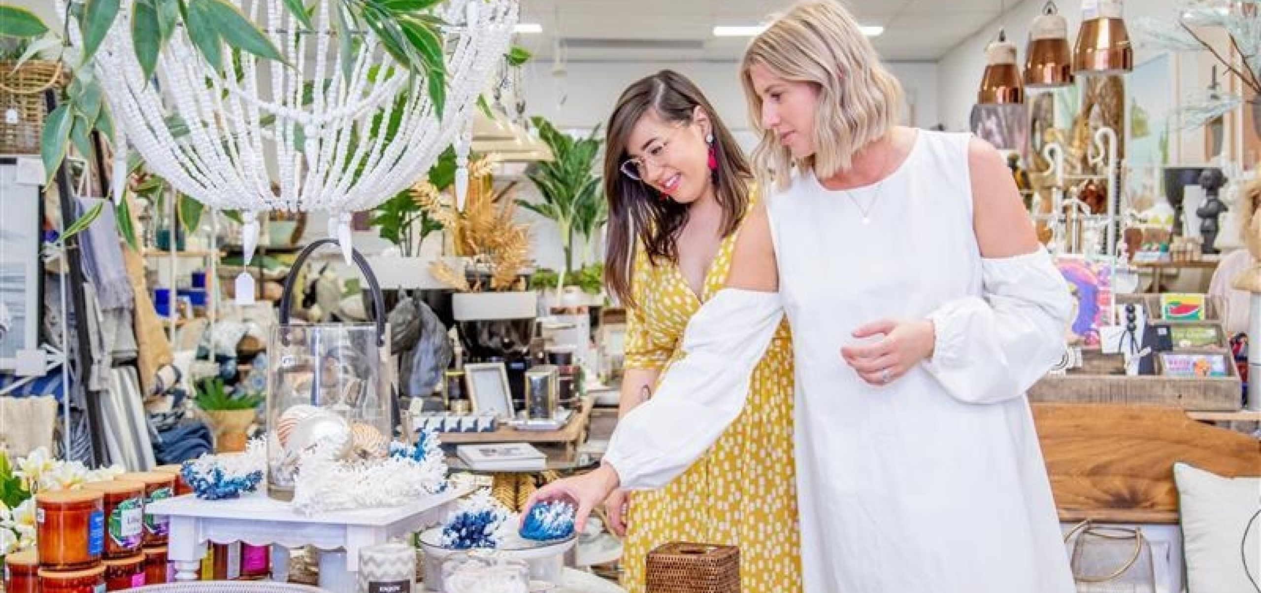 Two people shopping in a homewares store