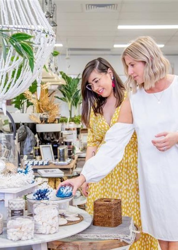Two people shopping in a homewares store