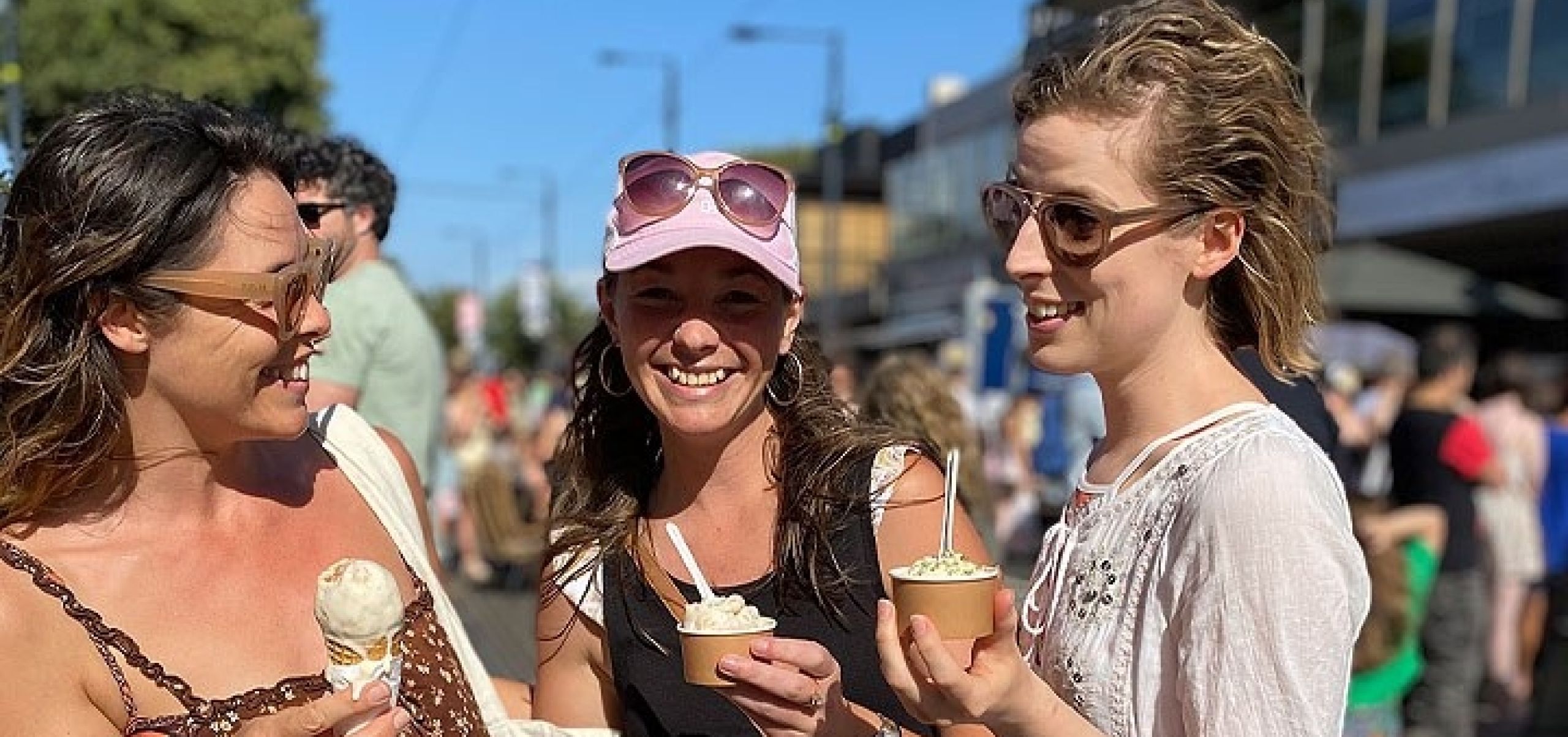Three women having ice creams