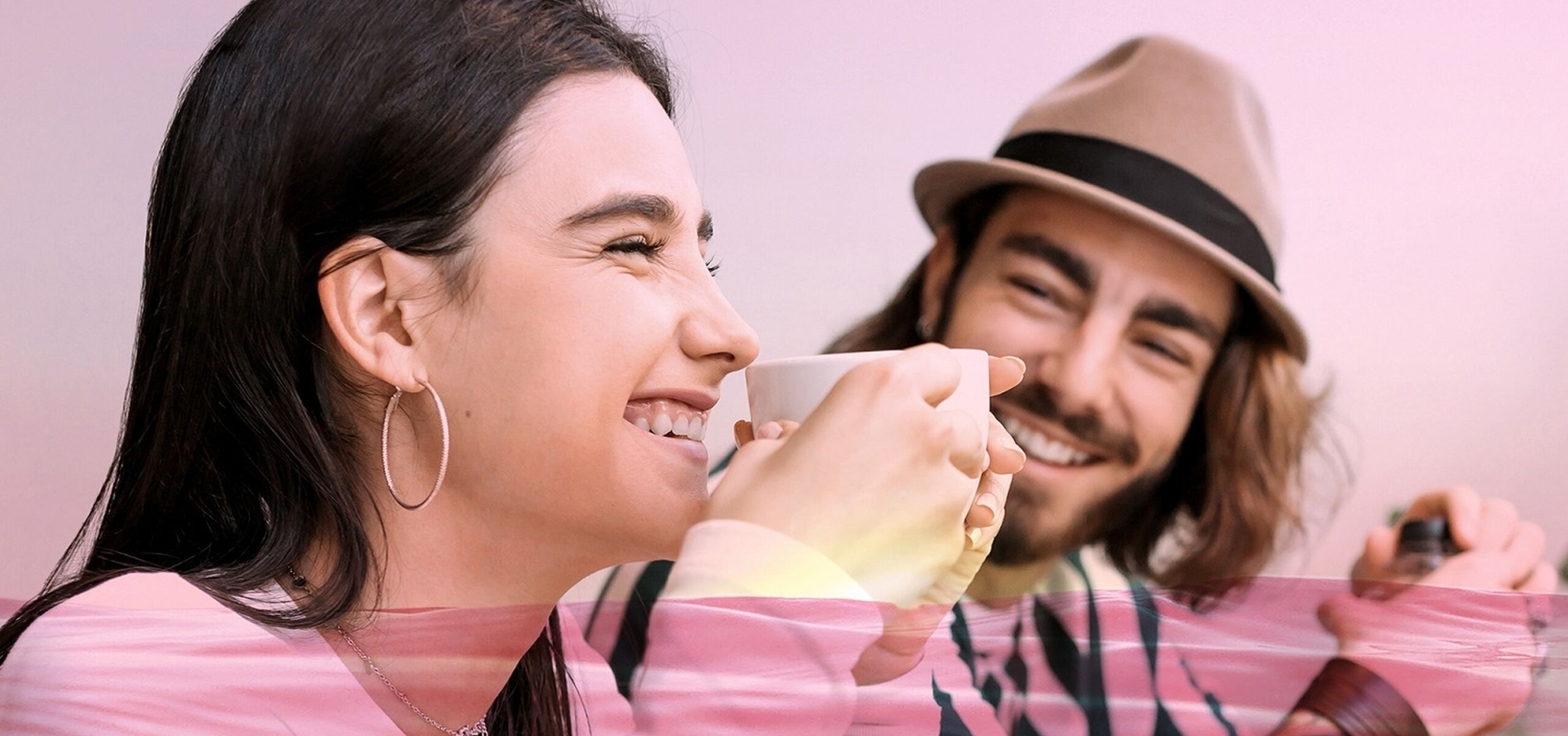 Young woman and man drinking coffee