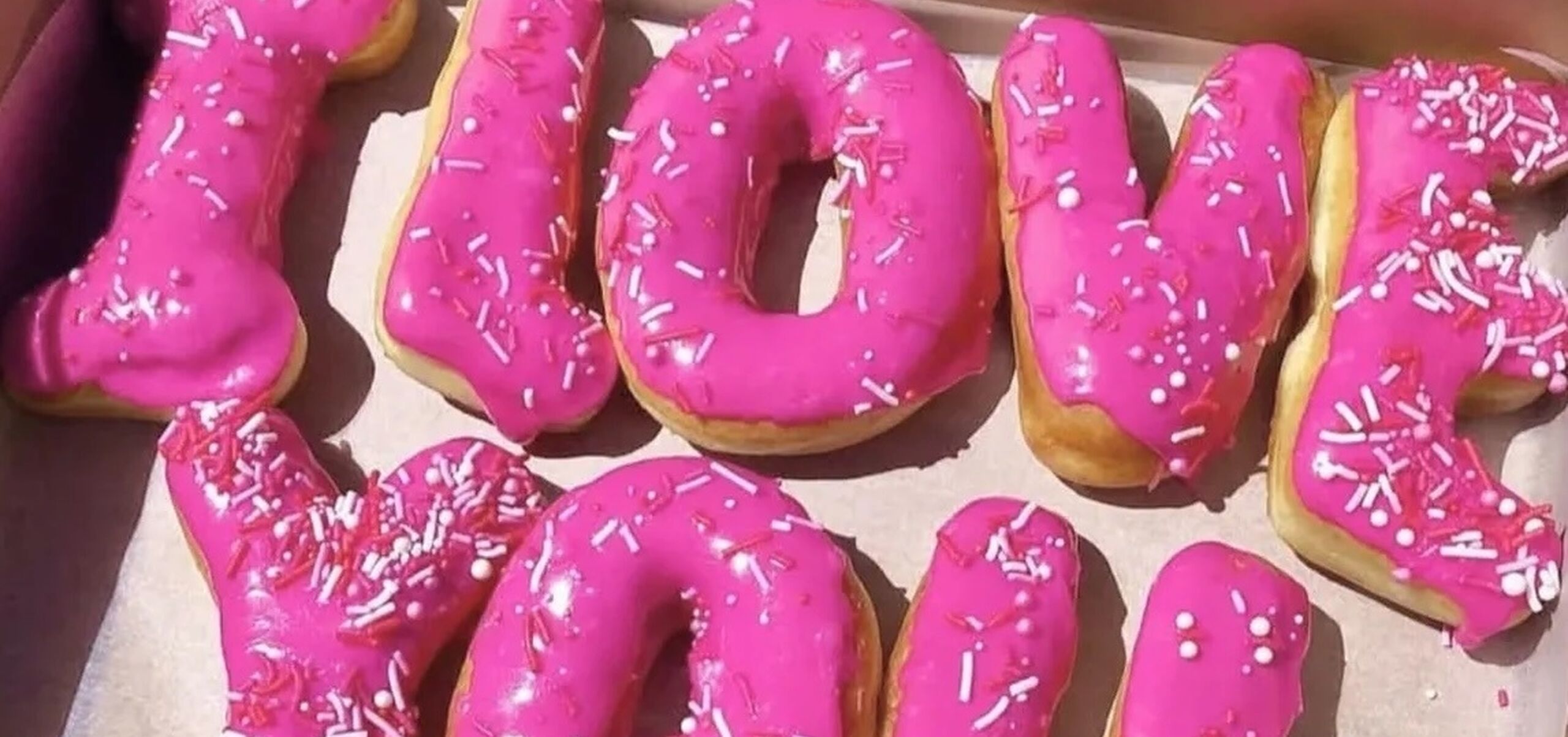 "i love you" wirtten in doughnuts