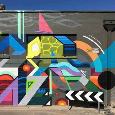 Colourful, geometric shapes on the side of a building in Chittleborough Lane