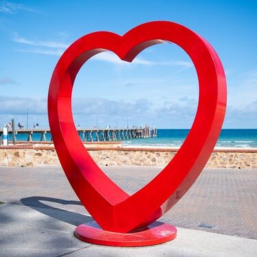 My Big Red heart Sculpture with seaside background